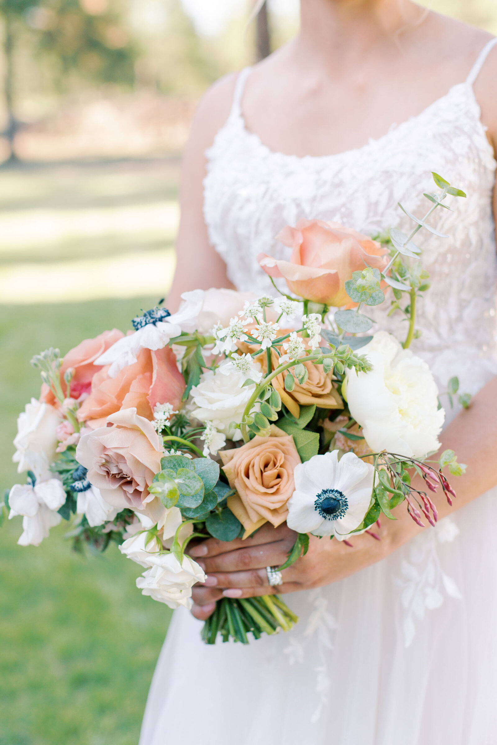 bride holding wedding bouquet to show seo tips for wedding photographers