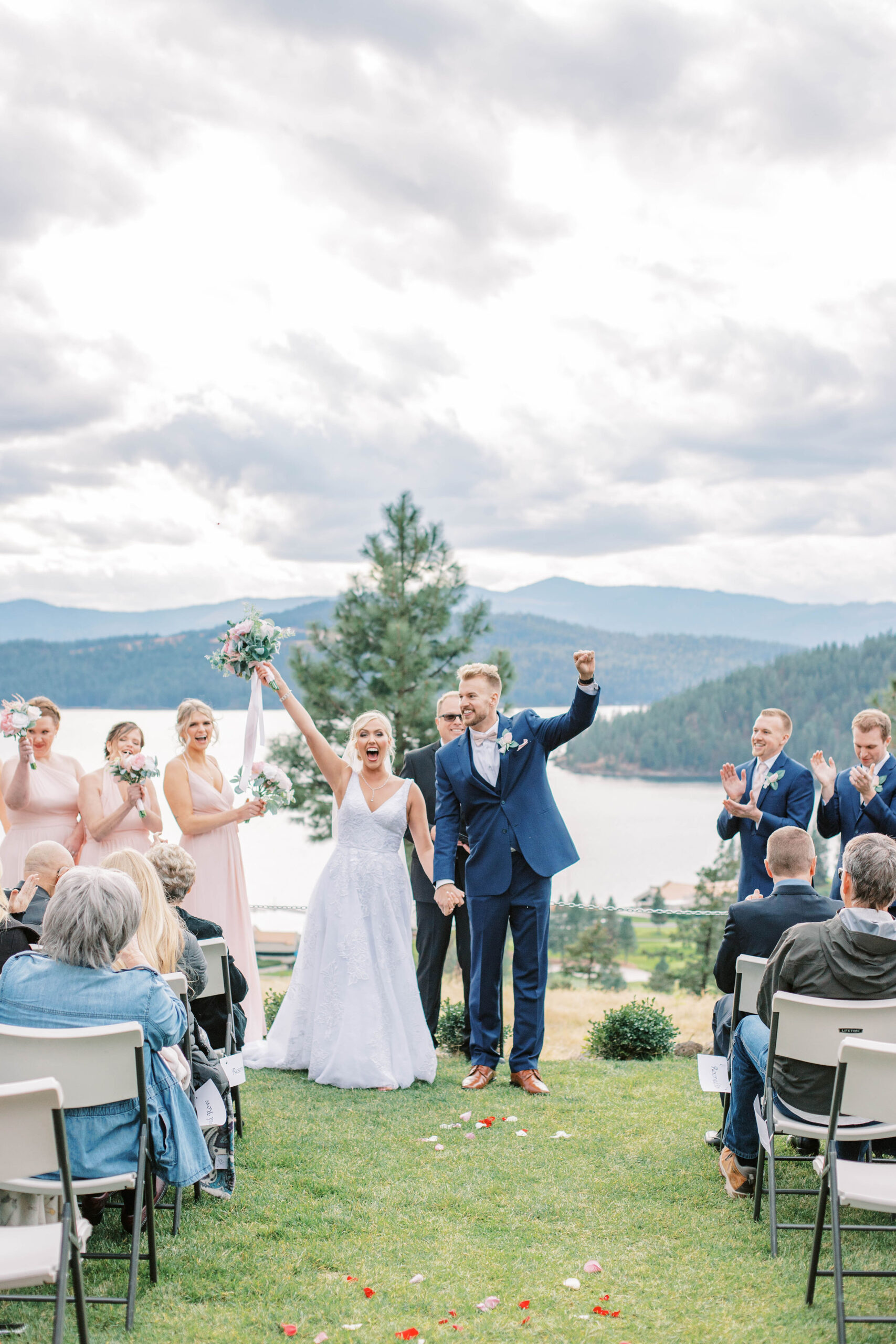 Bride and groom cheering after wedding to show seo tips for wedding photographers