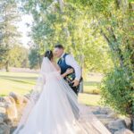 bride and groom kissing to show keywords for wedding photographers