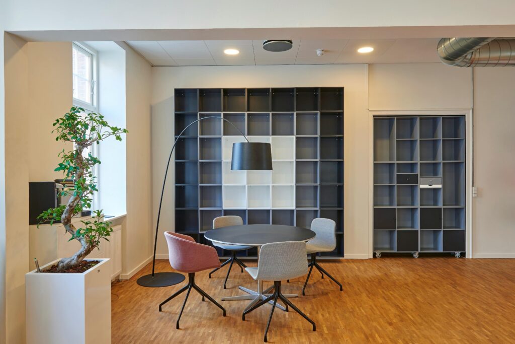 office space with tables and plants